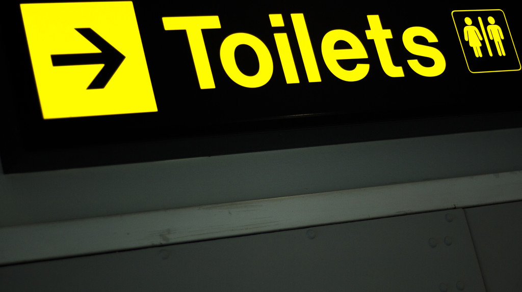 Airport information sign for toilets
