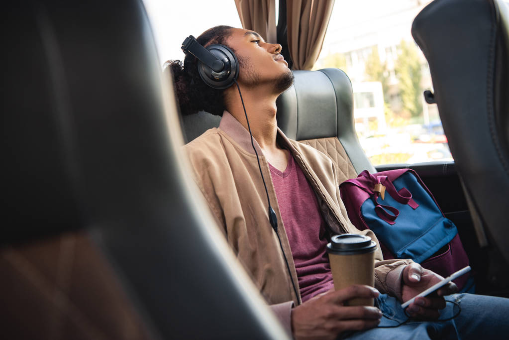 person wearing headphone