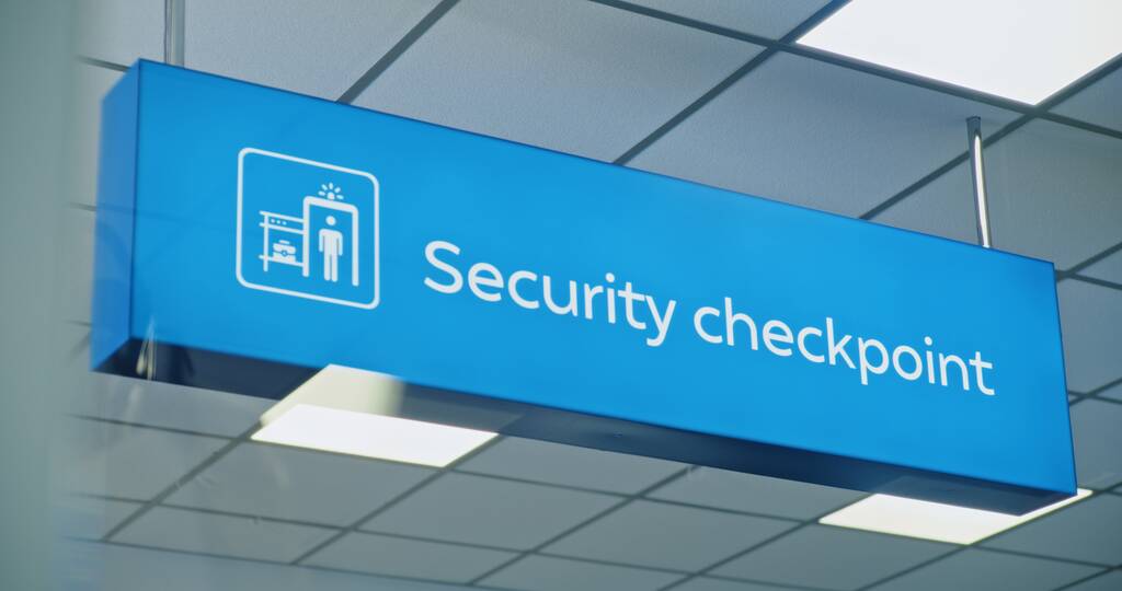 Blue security checkpoint sign