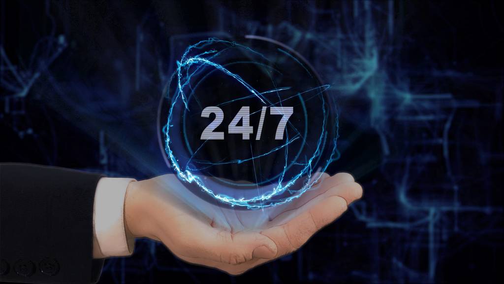Painted hand shows concept hologram 24 7 on his hand. Drawn man in business suit with future technology screen and modern cosmic background