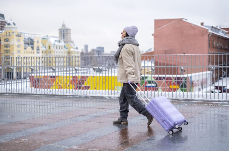 Woman wit luggage-street-