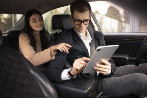 woman-talking-with-taxi-driver-car