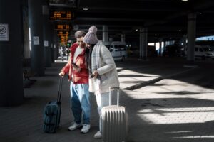 couple-traveling-with-vaccination-passports