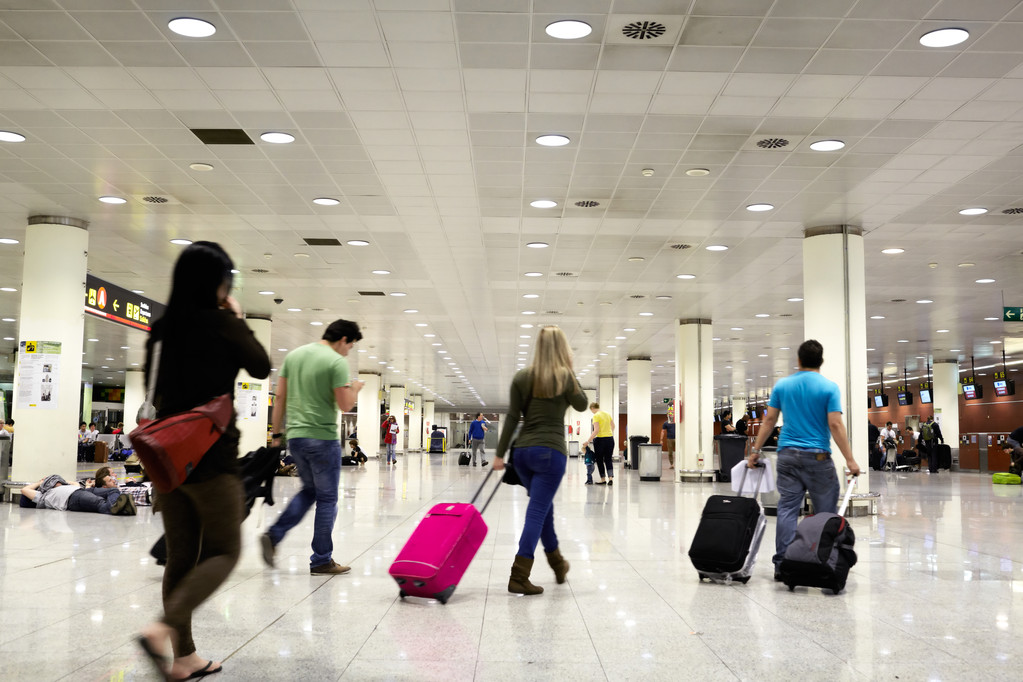 ..Blurred view of the people walking in the airport.