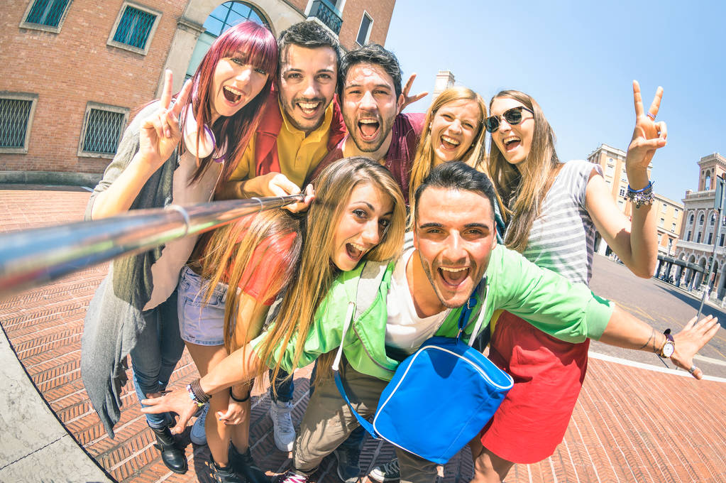 Group of friends taking selfie