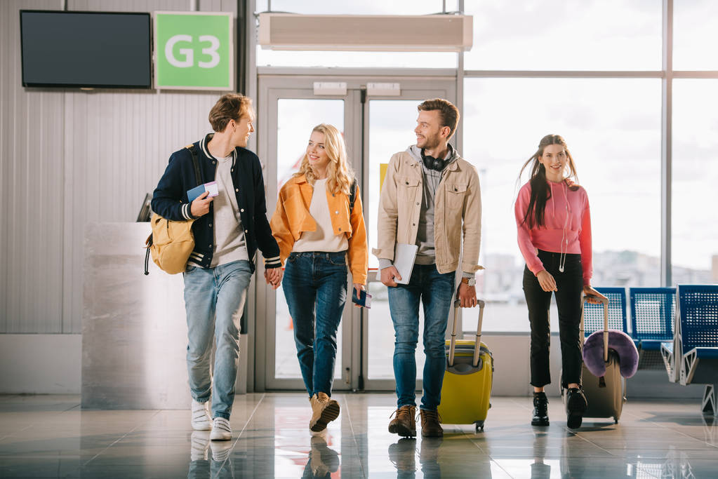 Group of people inside airport terminal